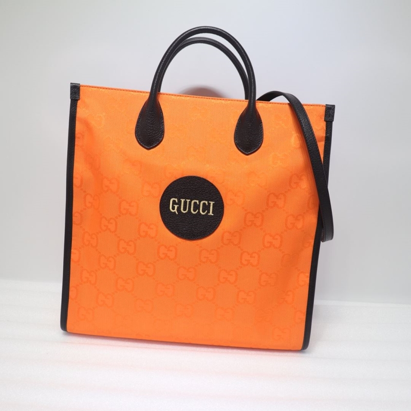 G*u*i shopping bags